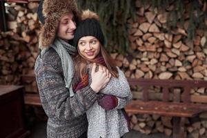 Happy Young Couple in Winter Park having fun.Family Outdoors. photo