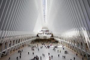 NEW YORK, UNITED STATES, AUGUST 30, 2017 - Unidentified people at Oculus in New York. Oculus, a mind-boggling glass-and-steel structure designed by Spanish architect Santiago Calatrava. photo
