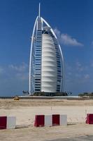 DUBAI, UAE, JANUARY 16, 2014 - View of hotel Burj al Arab in Dubai. At 321 m, it is the fourth tallest hotel in the world and has 202 rooms. photo
