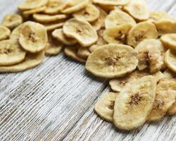 Dried candied banana slices or chips photo