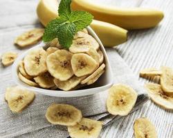 Dried candied banana slices or chips photo