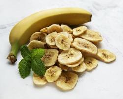 Dried candied banana slices or chips photo