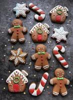 Christmas gingerbread cookies on dark background photo