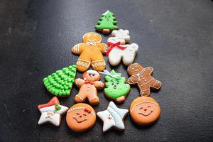 gingerbread cookies on the table shape christmas tree photo