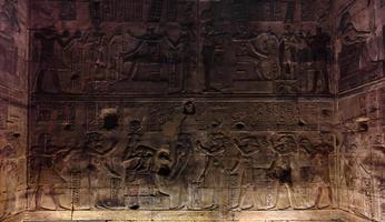 Ancient Egyptian hieroglyphs on the wall in Luxor in Egypt photo