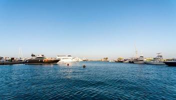 embankment street of the Red Sea in Egypt with ships boats photo