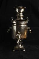old samovar.Metal vessel for boiling water and making tea. photo