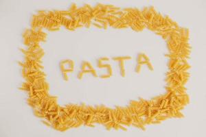 Inscription pasta on white background and frame around photo