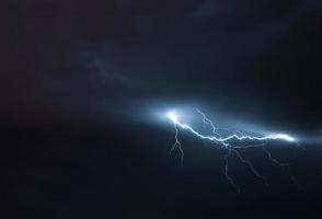 Lightning in the night sky. photo