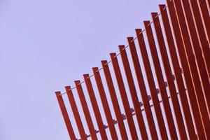 architectural photography of red steel fence photo