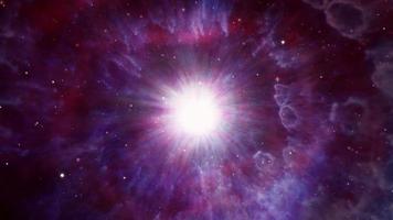 Traveling through star fields and purple cloud in space.
