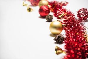 Christmas decoration balls and ornaments over abstract bokeh background on white background. Holiday background greeting card for Christmas and New Year. Merry Christmas photo