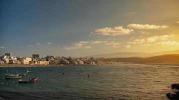 sunset on the Canteras beach in Las Palmas city photo