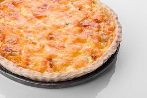 Delicious fresh quiche with broccoli, salmon and cheese photo