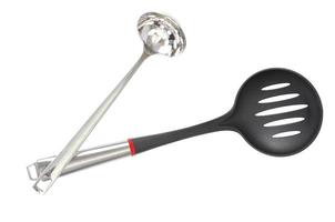 Kitchen utensils spoon with slots, slotted spoon isolated on white background. Studio Photo