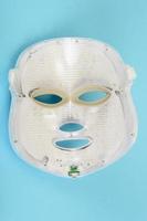 LED face mask. A device for lightening and rejuvenating the skin. Collagen therapy. photo