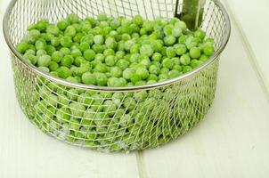 Preservation of vitamins. Frozen green peas. Organic vegetables. Studio Photo