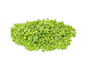 Pile of frozen blanched green peas isolated on white background. Healthy food. Studio Photo