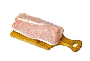 Fresh pink piece of raw pork meat, chop on white background. Studio Photo