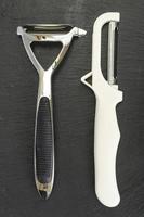 Peelers, kitchen gadgets for cleaning vegetables and fruits. Studio Photo