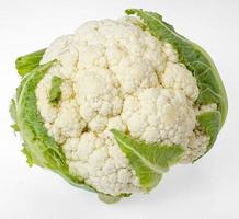 Fresh head of cauliflower on white background photo