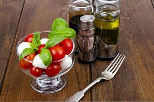 the Caprese salad in glass. Studio Photo. photo