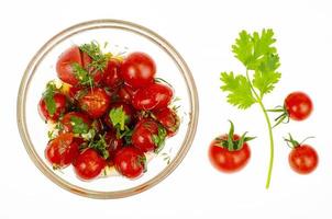 Pickled tomatoes with herbs and garlic. Studio Photo. photo