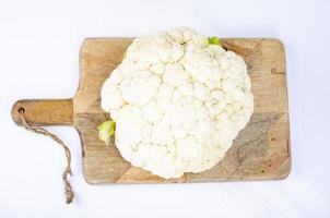 Head of fresh cauliflower on white background. Studio Photo. photo
