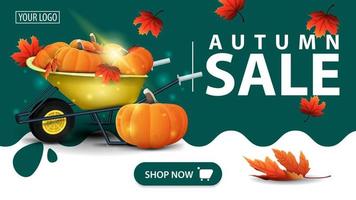Autumn sale, green banner with garden wheelbarrow with a harvest of pumpkins and autumn leaves