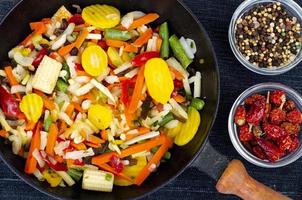 Seasonal vegetables platter in frying pan.Healthy food.Vegetarianism. Studio Photo. photo