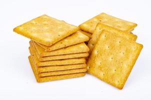 Delicious salty golden biscuit cracker square shape. Studio Photo. photo