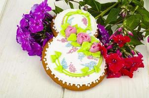Sweet gingerbread for international women's day, flowers. Studio Photo