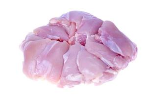 Fresh raw pink eco chicken fillet for cooking on white plate. Studio Photo