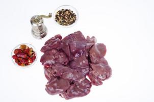 Offal, liver. Chicken liver on white background. Studio Photo. photo