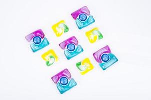 Multicolored capsules with gel for washing clothes and dishes. Studio Photo.. photo