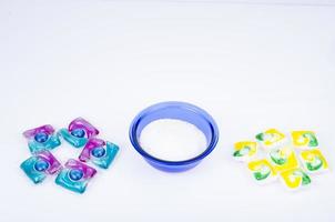 Various detergents for washing clothes, capsules and powder. Studio Photo. photo