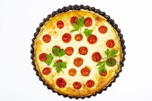 Homemade baking. Cherry tomato snack pie. Studio Photo. photo