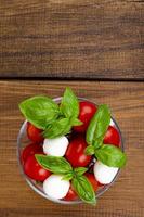 the Caprese salad in glass. Studio Photo. photo