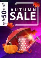 Autumn sale, purple vertical web banner with garden watering can, umbrella and ripe pumpkin