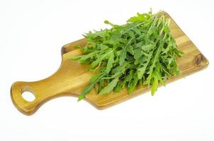 Fresh green farm arugula leaves for cooking use. Studio Photo