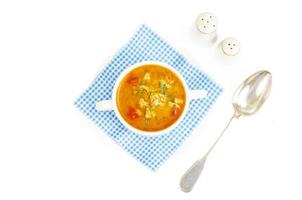 Thick homemade vegetable soup with rice, pumpkin and tomatoes photo