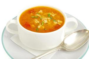 Thick homemade vegetable soup with rice, pumpkin and tomatoes photo