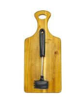 Kitchen hammer for meat on wooden cutting board. photo