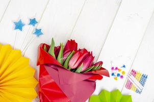 Banner with flowers and bright paper decorations. Children's holiday. Festive certificate, greeting card photo