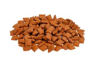 Dry food for cats and small dogs on white background.
