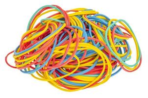 Many colourful multi coloured elastic rubber bands on white background. photo