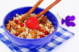 Oatmeal with Raisins, Walnuts and Strawberries photo