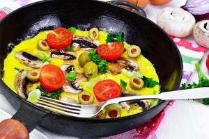 Healthy and Diet Food. Scrambled Eggs with Mushrooms photo