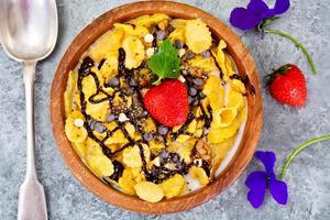 Cornflakes with Strawberry and Chocolate. Healthy Breakfast photo