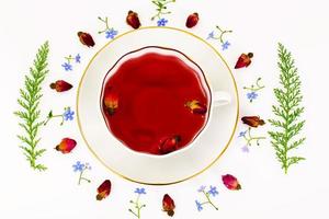 Red Rose Hibiscus Tea with Flowers photo